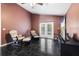 Comfortable sitting room with tile flooring, ceiling fan, and backyard access at 809 Brightview Dr, Lake Mary, FL 32746