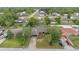 Aerial view of the neighborhood with mature trees and well-maintained homes at 901 Vicksburg St, Deltona, FL 32725