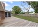 Spacious wood deck overlooking the well-maintained lawn at 901 Vicksburg St, Deltona, FL 32725