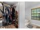 Walk-in closet and tiled tub are right next to each other at 901 Vicksburg St, Deltona, FL 32725
