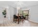Cozy dining area with a bay window, modern lighting, and seating for four at 901 Vicksburg St, Deltona, FL 32725