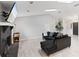 Bright living room with a fireplace, modern decor, and seamless access to the entryway at 901 Vicksburg St, Deltona, FL 32725