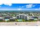Enjoy beachfront living with these lovely condos, with sparkling pools, and easy beach access in this captivating aerial view at 915 Ocean Shore Blvd # 8010, Ormond Beach, FL 32176