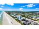 Breathtaking aerial view of a condo complex along a scenic beach, perfect for coastal living and vacation getaways at 915 Ocean Shore Blvd # 8010, Ormond Beach, FL 32176