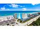 Breathtaking aerial view of a beachfront condo community with convenient parking and stunning ocean views at 915 Ocean Shore Blvd # 8010, Ormond Beach, FL 32176