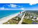 Panoramic aerial showcases beachfront property along the scenic coastline at 915 Ocean Shore Blvd # 8010, Ormond Beach, FL 32176