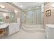Bathroom featuring a tub and shower combination with gold trim at 915 Ocean Shore Blvd # 8010, Ormond Beach, FL 32176