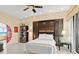 Bright bedroom with ocean view, tiled floors, and a unique closet feature at 915 Ocean Shore Blvd # 8010, Ormond Beach, FL 32176