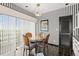 Bright breakfast nook with striped walls and a table and chairs overlooking a view at 915 Ocean Shore Blvd # 8010, Ormond Beach, FL 32176