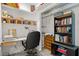 Well-organized closet area with built-in shelving, a desk and ample storage space at 915 Ocean Shore Blvd # 8010, Ormond Beach, FL 32176