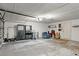 This garage includes custom storage and seating area at 915 Ocean Shore Blvd # 8010, Ormond Beach, FL 32176
