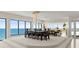 Ocean view dining area and living space with natural light and elegant decor at 915 Ocean Shore Blvd # 8010, Ormond Beach, FL 32176