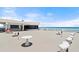 Expansive rooftop terrace boasts ocean views and ample seating for entertaining at 915 Ocean Shore Blvd # 8010, Ormond Beach, FL 32176