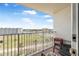Private balcony offering views of the surrounding landscape and clear skies at 935 S Atlantic Ave # 505, Daytona Beach, FL 32118