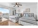 Bedroom showcasing two twin beds with ocean view and coastal decor creating a serene atmosphere at 935 S Atlantic Ave # 505, Daytona Beach, FL 32118