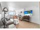 Bright living room featuring a sofa, decorative pieces, and a television at 935 S Atlantic Ave # 505, Daytona Beach, FL 32118