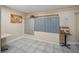 Indoor mailbox area with multiple units, tables and a bulletin board with notices and local interest items at 935 S Atlantic Ave # 505, Daytona Beach, FL 32118