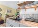Well-equipped kitchenette featuring sleek countertops, appliances, and a cozy breakfast nook for dining at 935 S Atlantic Ave # 511, Daytona Beach, FL 32118