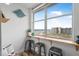 Bright living space with a ocean view, natural light, a long bar and three stools at 935 S Atlantic Ave # 511, Daytona Beach, FL 32118