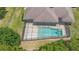 Overhead view of private screened-in pool and patio, providing a relaxing outdoor space at 980 Marjorie Rawlings Dr, Deland, FL 32720