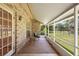 Enjoy the outdoors in this screened porch with views of the fenced backyard at 980 Marjorie Rawlings Dr, Deland, FL 32720