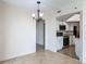 A view of the renovated kitchen with granite countertops and stainless-steel appliances at 1 Oceans West Blvd # 2A1, Daytona Beach, FL 32118