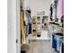 Organized walk-in closet providing ample storage space for clothing, shoes, and accessories at 1000 Megano Blvd, Deland, FL 32724
