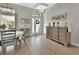 Bright and airy dining area with a cozy table setting and seamless access to the front entrance at 1000 Megano Blvd, Deland, FL 32724