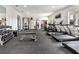 Well-equipped gym featuring treadmills, weights, and various exercise machines at 1000 Megano Blvd, Deland, FL 32724