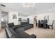 Open-concept living room seamlessly connects the dining and kitchen areas, ideal for entertaining at 1002 River Falls Cir, Deland, FL 32720