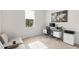 Well-lit home office with functional desk and ample storage space at 1002 River Falls Cir, Deland, FL 32720