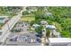 Property aerial view showing the lush landscaping and surrounding neighborhood at 104 N Park Pl, Edgewater, FL 32132