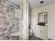 Bathroom with tiled shower and vanity at 104 N Park Pl, Edgewater, FL 32132