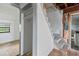 Staircase in hallway with unfinished walls at 104 N Park Pl, Edgewater, FL 32132