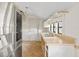 Outdated kitchen featuring a double sink, laminate countertops, and a stainless steel refrigerator at 104 N Park Pl, Edgewater, FL 32132
