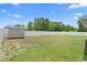 Large, fenced backyard, perfect for outdoor activities and relaxation at 10800 Crescent Ridge Loop, Clermont, FL 34711