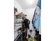 Organized walk-in closet with shelves, rods, and various storage solutions at 10800 Crescent Ridge Loop, Clermont, FL 34711