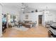 Spacious living room with neutral tones, comfortable seating, and bright natural light at 10800 Crescent Ridge Loop, Clermont, FL 34711