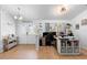 The home office area is set up near the front door in the living room at 10800 Crescent Ridge Loop, Clermont, FL 34711