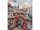 Walk-in pantry with wire shelving providing ample storage for food items and household supplies at 10800 Crescent Ridge Loop, Clermont, FL 34711
