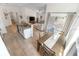 Bright and airy living room with a modern kitchen, spacious dining area, and sliding doors leading to the outdoors at 1092 Gage Ave, Deltona, FL 32738