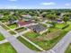 Aerial view of a home with mature trees and landscaping in a quiet neighborhood at 1101 Anderson St, Deltona, FL 32725