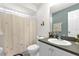 Functional bathroom with a shower, toilet, and vanity with ample counter space at 1101 Anderson St, Deltona, FL 32725