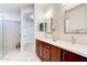 Elegant bathroom with double vanities, sleek fixtures, and a glass shower at 112 Chelsea Place Ave, Ormond Beach, FL 32174