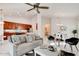 Inviting living area showcases modern furniture, open layout, and seamless connection to the kitchen at 112 Chelsea Place Ave, Ormond Beach, FL 32174