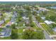 Aerial view of a suburban neighborhood with tree-lined streets and well-maintained homes at 1166 Tracy Dr, Port Orange, FL 32129