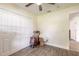 Functional bedroom space with a closet, wood-look floors, baseboard trim at 1166 Tracy Dr, Port Orange, FL 32129