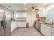 Bright kitchen featuring stainless appliances, modern fixtures, and lots of cabinet space at 1166 Tracy Dr, Port Orange, FL 32129