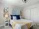 Bedroom showcases natural light, neutral walls, wood-look floors, and closet at 1203 W 20Th St, Sanford, FL 32771
