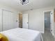 A relaxing bedroom space with a modern ceiling fan, a walk-in closet, and access to the bathroom at 1203 W 20Th St, Sanford, FL 32771